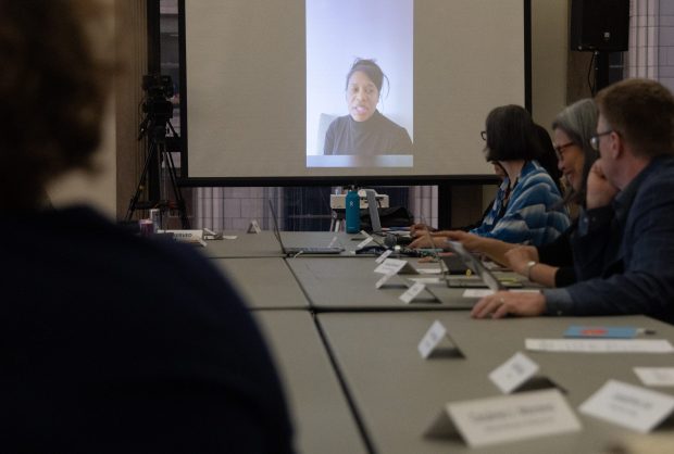 Clinée Hedspeth, center, the commissioner of the Department of Cultural Affairs and Special Events, speaks over a video call during an Arts Advisory Council meeting at the Cultural Center in Chicago on Feb. 25, 2025. (Audrey Richardson/Chicago Tribune)