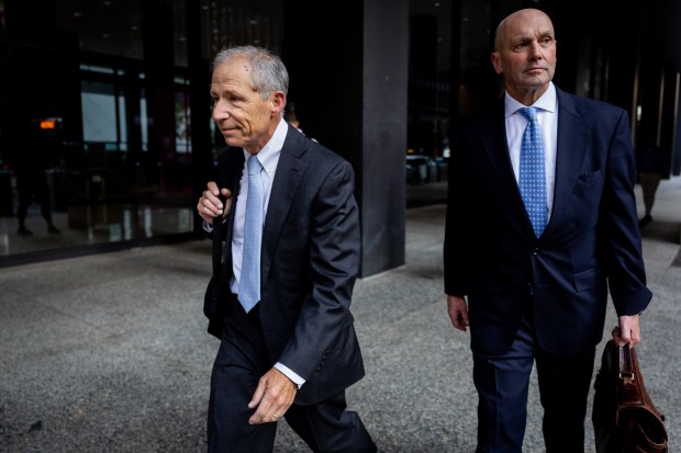 Former AT&T Illinois President Paul La Schiazza, left, leaves the Dirksen U.S. Courthouse after a mistrial was declared in his bribery trial on Sept. 19, 2024. (Tess Crowley/Chicago Tribune)