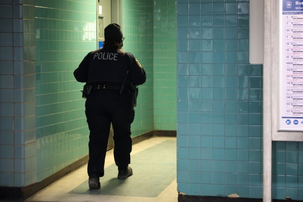 A Metra Police Officer monitors Millennium Station in Chicago on Feb. 21, 2025. (Audrey Richardson/Chicago Tribune)