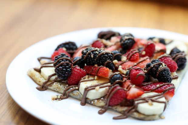 A Nutella crepe with mixed berries and banana at the Nutella Cafe in the Loop on May 8, 2025. (Eileen T. Meslar/Chicago Tribune)