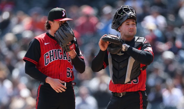 White Sox starter Davis Martin and catcher Matt Thaiss meet on the mound in the fourth inning against the Astros on May 3, 2025, at Rate Field. (Chris Sweda/Chicago Tribune)