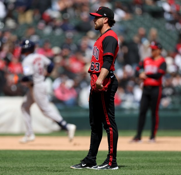 White Sox reliever Penn Murfee stands by as Astros center fielder Jake Meyers rounds the bases after hitting a three-run home run in the sixth inning on May 3, 2025, at Rate Field. (Chris Sweda/Chicago Tribune)