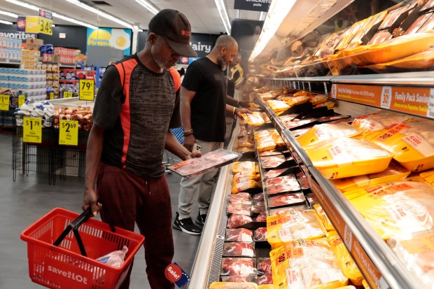 John Lee shops at the Save-A-Lot grocery store in West Garfield Park on Sept. 5, 2024. (Antonio Perez/Chicago Tribune)