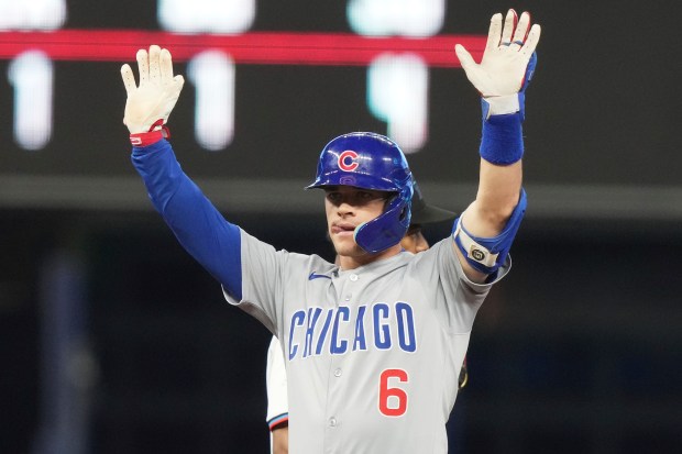 Chicago Cubs' Matt Shaw (6) reacts after hitting a double during the fifth inning of a baseball game against the Miami Marlins Wednesday, May 21, 2025, in Miami. (AP Photo/Lynne Sladky)