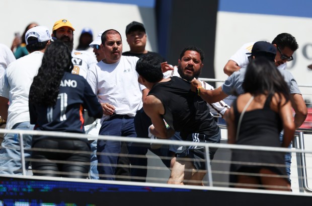 San Diego FC and Los Angeles Galaxy fans fight after the match at Snapdragon Stadium on May 24, 2025, in San Diego. (Meg McLaughlin/San Diego Union-Tribune)