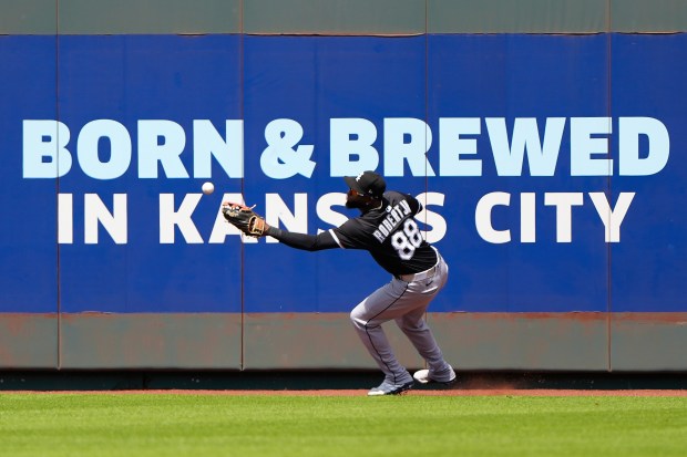 White Sox center fielder Luis Robert Jr. fields a two-run triple hit by the Royals' Maikel Garcia during the fifth inning on May 8, 2025, in Kansas City, Mo. (Charlie Riedel/AP)