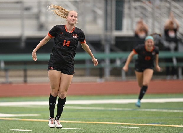 Libertyville's Sydney Dulak reacts after scoring a goal