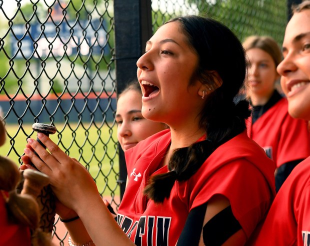 Mundelein pitcher Sophia Zepeda cheers for a teammate
