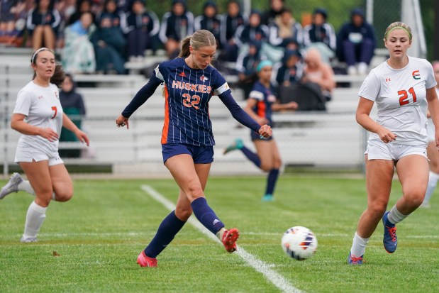 Naperville North's Claire DeCook shoots the ball