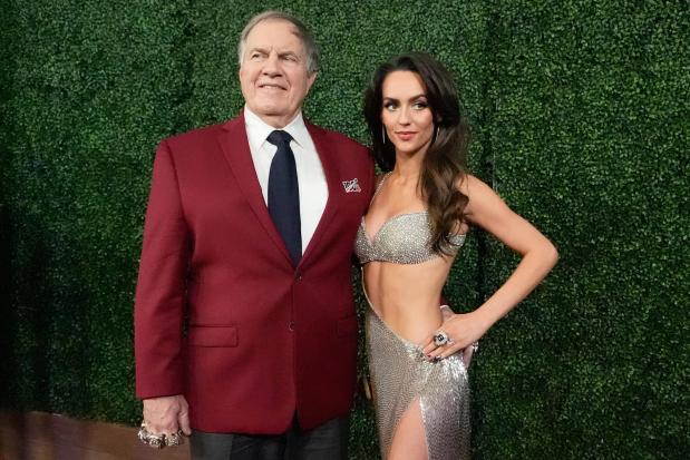 Former NFL coach Bill Belichick and girlfriend Jordon Hudson pose on the red carpet at the NFL Honors award show Feb. 6, 2025, in New Orleans. (AP Photo/Brynn Anderson)