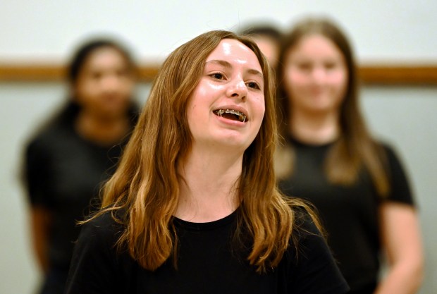 Adelle Butler of Libertyville sings a solo part with other performers of the Improv Playhouse Training Center at the GLMV Extreme Block Party Family Expo and Taste of the Towns on May 3, 2025 in Mundelein at the DoubleTree by Hilton Hotel Mundelein. (Karie Angell Luc/Pioneer Press)