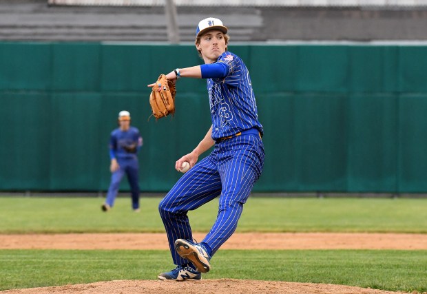 Highland's Caden VanderMeyden delivers a pitch against West Side