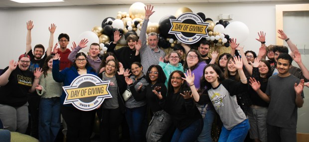 Purdue University Northwest Honors College students take part in a group photo with PNW alumnus Dan Durochik. PNW received nearly $2 million overall in gifts from supporters. (Photo courtesy of Purdue University Northwest)