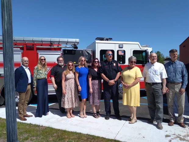 The Chesterton Town Council, along with Fire Chief Sean O'Donnell, stand in front of a fire station at groundbreaking ceremonies Friday, May 16, 2025. (Jim Woods/for Post-Tribune)