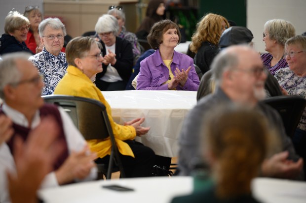 Attendees applaud as local religious leaders and congregants gather to participate in the Northwest Indiana Islamic Center's interfaith potluck event on Friday, May 23, 2025. (Kyle Telechan/for the Post-Tribune)