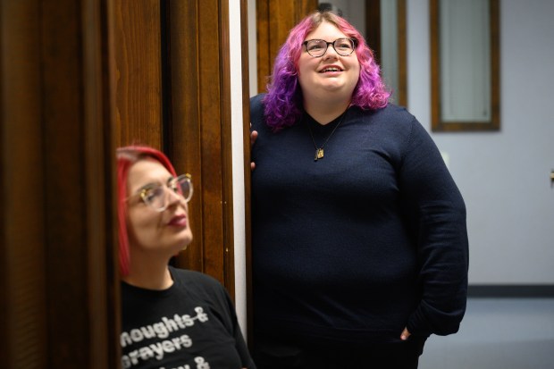 Everybody Counts independent living navigators Brianna Fotinos, on right, and Jordan Musenbrock, talk about their recent trip to Washington D.C. to protest federal Medicaid cuts, at the organization's Merrillville office on Wednesday, May 21, 2025. (Kyle Telechan/for the Post-Tribune)