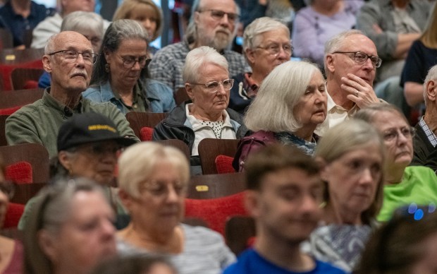 Members of the audience look on as U.S. Rep. Frank Mrvan, D-Highland, speaks at the Memorial Opera House in Valparaiso, Indiana, Thursday, May 29, 2025. Mrvan is holding a series of community conversations throughout the region to give folks updates on what's been going on in DC and address their concerns here. (Andy Lavalley/for the Post-Tribune)