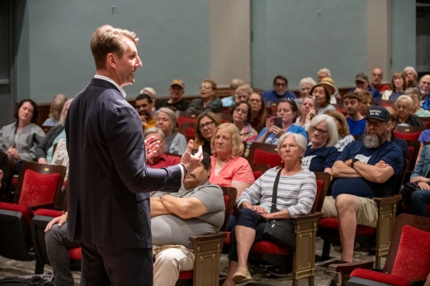U.S. Rep. Frank Mrvan, D-Highland, speaks as members of the audience look on at the Memorial Opera House in Valparaiso, Indiana, Thursday, May 29, 2025. Mrvan is holding a series of community conversations throughout the region to give folks updates on what's been going on in DC and address their concerns here. (Andy Lavalley/for the Post-Tribune)