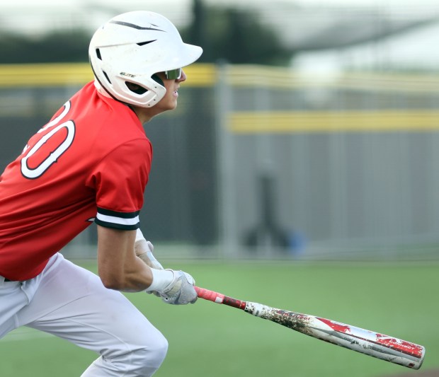 Lincoln-Way Central's Liam Arsich hits a triple during the Class 4A Andrew Regional semifinal baseball game against T.F. South in Tinley Park on Wednesday, May 28, 2025. (James C. Svehla / for the Daily Southtown)