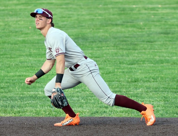 Brother Rice's Jackson Natanek chases a pop up during the baseball against St. Laurence in Burbank on Thursday, May 15, 2025. (James C. Svehla / for the Daily Southtown)