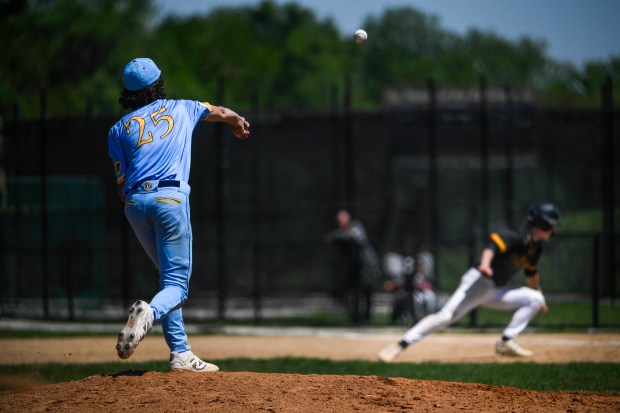 De La Salle sophomore pitcher Beckett Hulten (25) attempts to throw out a Richards runner during a De La Salle at Richards baseball game in Oak Lawn, IL on Friday, May 23, 2025. (Andrew Burke-Stevenson/for the Daily Southtown)