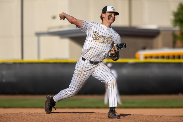 Oak Forest's Andrew Dawson (1) throws a pitch against Lemont during a South Suburban Blue Conference game in Oak Forest on Monday, May 12, 2025. (Troy Stolt for the Daily Southtown)