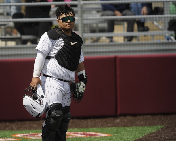 Brother Rice's catcher Josh Torres (32) gets ready to set up behind the plate against Providence during a Chicago Catholic League game Saturday, May 10, 2025 in Chicago, IL. (Steve Johnston/for the Daily Southtown)
