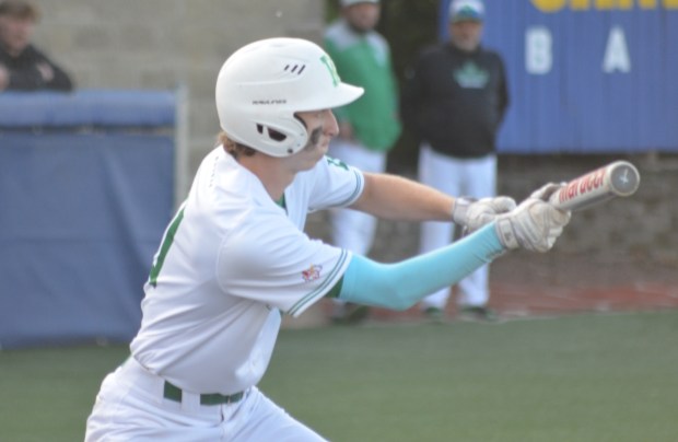 Providence's Michael Noonan bunts his way for a single against Bloom during a Class 4A Sandburg Regional semifinal in Orland Park on Wednesday, May 28, 2025. (Jeff Vorva / Daily Southtown)