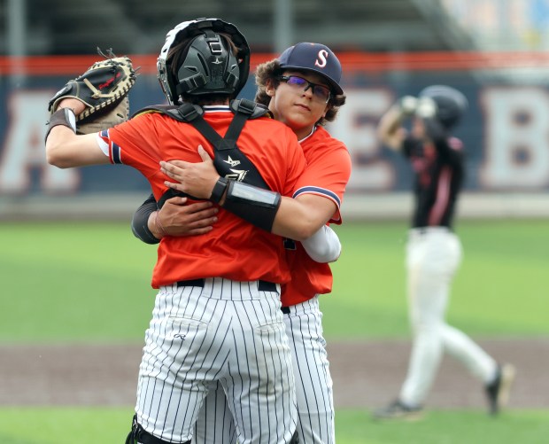 Stagg's pitcher , John Skordas, right, hugs his catcher Brody Jeffers, left, after winning the the Class 4A Stagg Regional semifinal baseball game against Marist in Palos Hills on Thursday, May 29, 2025. (James C. Svehla / for the Daily Southtown)