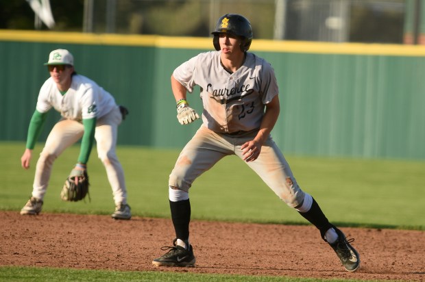 St. Laurence's Connor Marino (23) takes a lead of second against Providence during a Chicago Catholic League game Monday, May 5, 2025 in New Lenox, IL. (Steve Johnston/for the Daily Southtown)