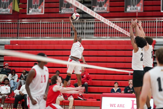 Homewood-Flossmoor's Surendran Heyward (7) goes up for a kill attempt against Andrew during a SouthWest Suburban Conference volleyball match at Homewood-Flossmoor High School on Thursday, May 1, 2025. (Sean King / for The Daily Southtown)