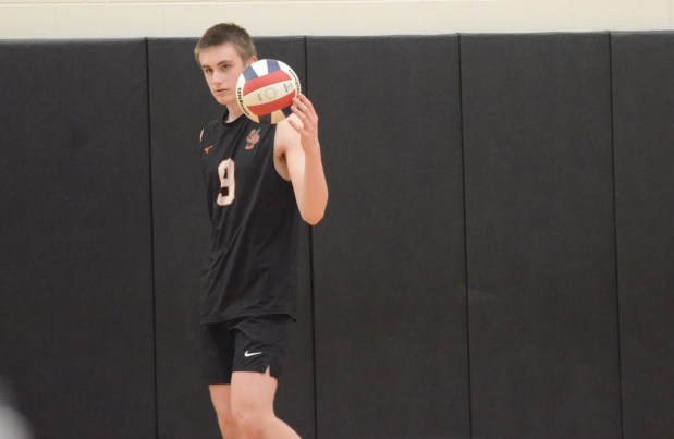 Lincoln-Way West's Colin Baikie gets ready to serve against Lockport during a SouthWest Suburban Conference match in New Lenox on Thursday, May 8, 2025. (Jeff Vorva / Daily Southtown)