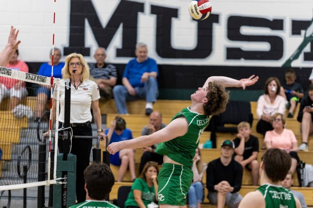 Providence's Sean Dovin (18) goes up for the ball at the net against Evergreen Park during a nonconference game in Evergreen Park on Wednesday, May 14, 2025. (Vincent D. Johnson / for the Daily Southtown)