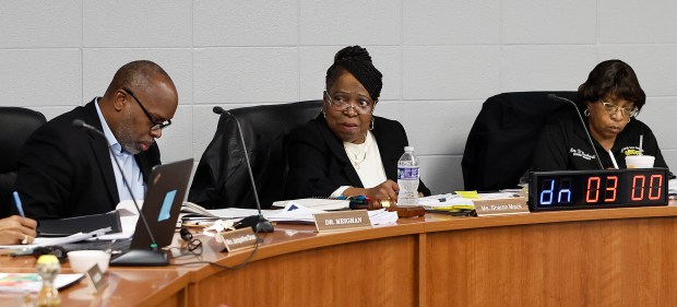 Superintendent Dr. Duane Meighan, President Sharon Mack, and Vice-President Doris Blackwell (l to r) react to parents voicing concerns at a Country Club Hills School District 160 boarding meeting. The parents have concerns about district spending and conditions in the schools. The meeting took place on Tuesday, May 20, 2025. (John Smierciak / for the Daily Southtown)