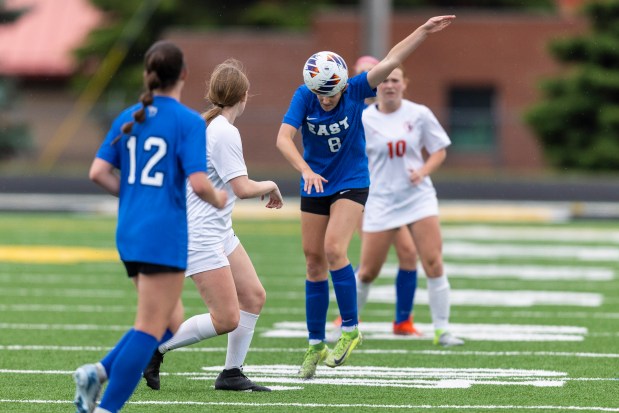 Lincoln-Way East's Adelyn Thomas (8) with a header off of a Lincoln-Way West kick in the Class 3A Joliet West Sectional semifinals in Joliet on Tuesday, May 27, 2025. (Vincent D. Johnson / for the Daily Southtown)