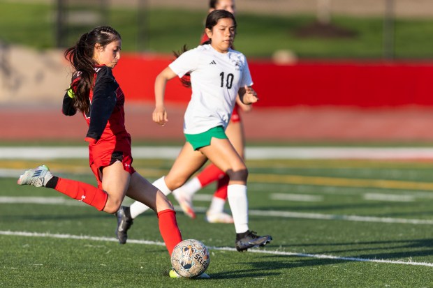Eisenhower's Galilea Esparza (9) takes a shot on goal against Oak Lawn during a South Suburban Red game in Blue Island on Tuesday, May 13, 2025. (Vincent D. Johnson / for the Daily Southtown)