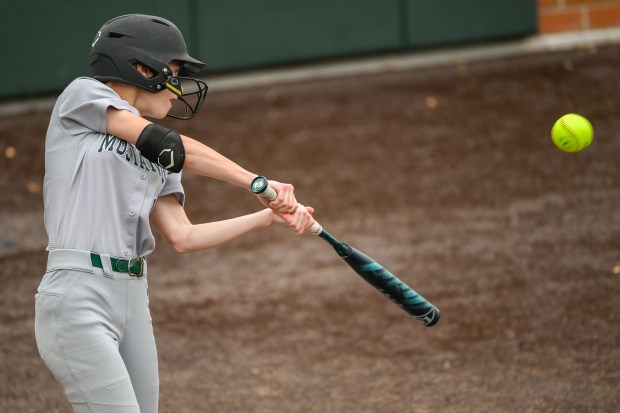 Evergreen Park freshman Molly Goyke (1) swings hits a pitch during the Evergreen Park vs. Mansueto class 3A Evergreen Park Regional semifinal in Evergreen Park, IL on Tuesday, May 27, 2025. (Andrew Burke-Stevenson/for the Daily Southtown)