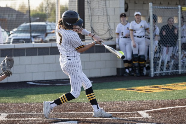 Andrew's Emma Scislowicz (7) drives in the the game winning run against Lincoln-Way West in the bottom of the ninth inning during a Southwest Suburban Conference game in Tinley Park on Monday, May 5, 2025. (Troy Stolt for the Daily Southtown)