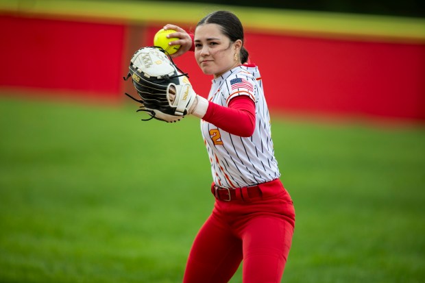 Tinley Park's Lilia Flores (2) throws to first base against Mother McAuley during a nonconference game in Tinley Park on Friday, May 2, 2025. (Vincent D. Johnson / for the Daily Southtown)
