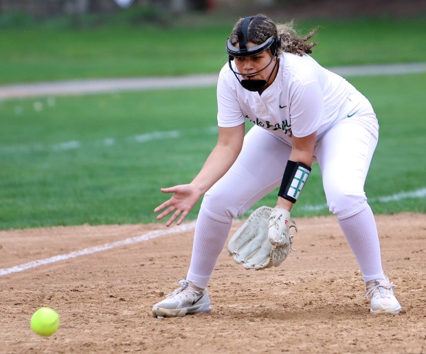 Oak Lawn's Kamya Feigl fields the ball during the girls softball game against Stagg in Oak Lawn on Wednesday, April 30, 2025. (James C. Svehla / for the Daily Southtown)