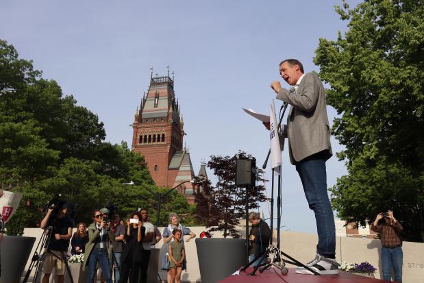Ryan Enos, a professor of government at Harvard University, speaks at a protest against President Donald Trump's recent sanctions against Harvard in front of Science Center Plaza on Tuesday, May 27, 2025, in Cambridge, Mass. (AP Photo/Leah Willingham)