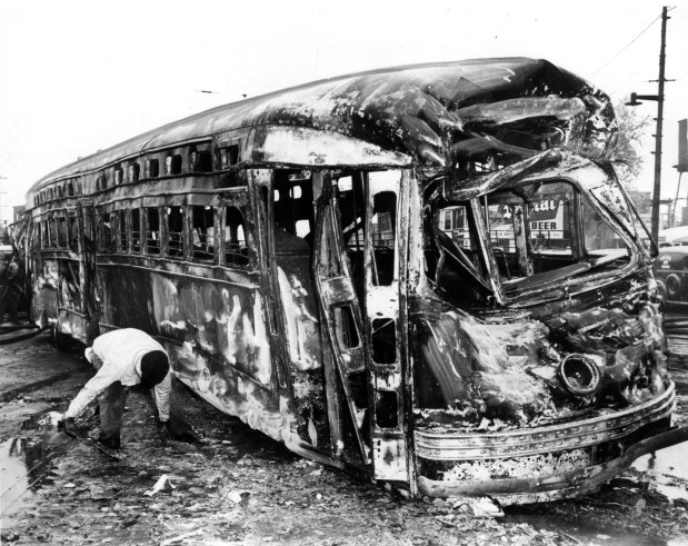 Many people were eating in their homes when the nearby crash and fire occurred at 6:30 p.m. on May 25, 1950. Thirty-two of the victims died in the streetcar, one of the new "Green Hornet" type operating on the Broadway line. They died in a mass crushed near the exits, and most of them were burned beyond recognition. (Chicago Tribune historical photo)