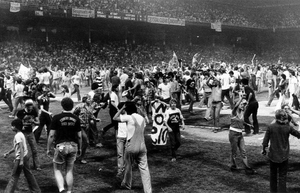 The anti-disco promotion at Comiskey Park between games of a planned double-header in 1979 drew thousands of teens, who poured onto the field between games. Damage done during the demonstration forced the Sox to forfeit the second game. (Ed Wagner/Chicago Tribune)
