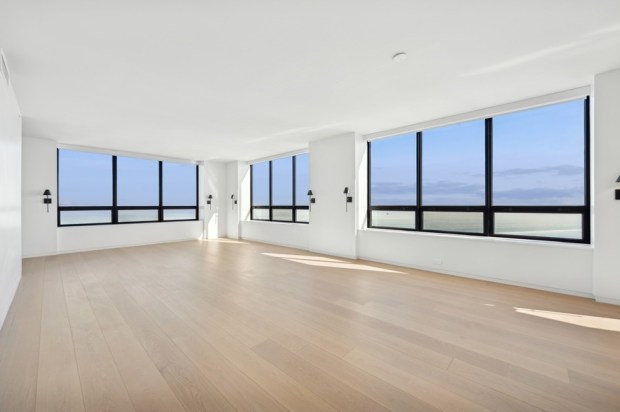 This five-bedroom, four-and-a-half bath home on the 70th floor of the Residences at Water Tower was recently listed for nearly $3.5 million. (VHT Studios)