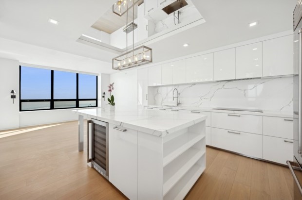 This five-bedroom, four-and-a-half bath home on the 70th floor of the Residences at Water Tower was recently listed for nearly $3.5 million. (VHT Studios)