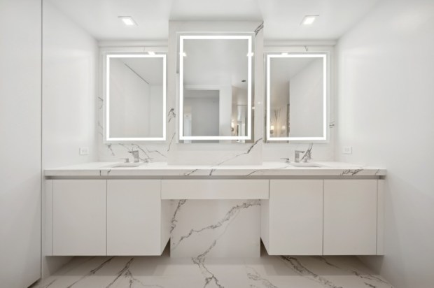This five-bedroom, four-and-a-half bath home on the 70th floor of the Residences at Water Tower was recently listed for nearly $3.5 million. (VHT Studios)