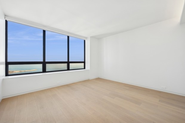 This five-bedroom, four-and-a-half bath home on the 70th floor of the Residences at Water Tower was recently listed for nearly $3.5 million. (VHT Studios)