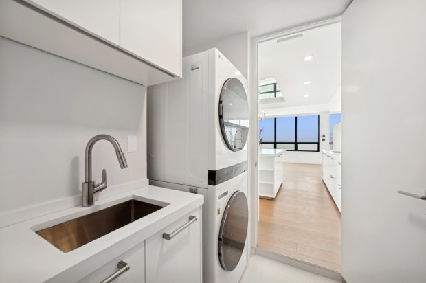 This five-bedroom, four-and-a-half bath home on the 70th floor of the Residences at Water Tower was recently listed for nearly $3.5 million. (VHT Studios)