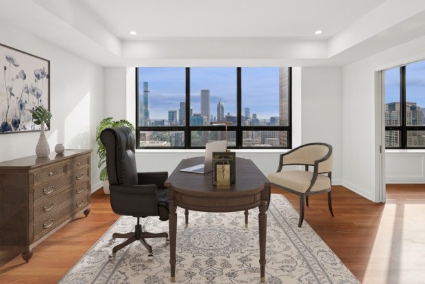 This Water Tower Residences condo at 180 E. Pearson St., Unit 4606, has expansive windows with south-facing views of Lake Michigan and the city skyline. (Mikel Pickett/VHT)