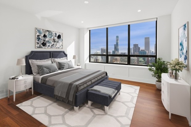 This Water Tower Residences condo at 180 E. Pearson St., Unit 4606, has expansive windows with south-facing views of Lake Michigan and the city skyline. (Mikel Pickett/VHT)
